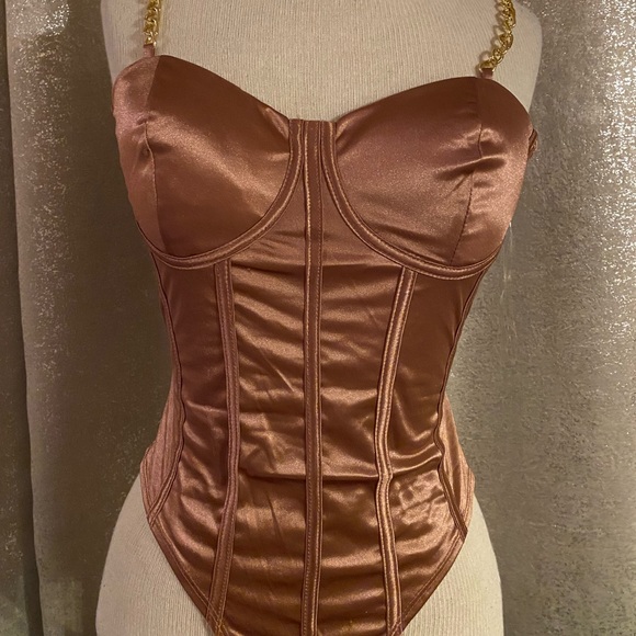 AKIRA Tops - Akira Satin Pink Cut-out Bodysuit with Gold Chain link strap